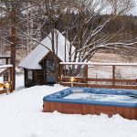 spa eneige en hiver sur une terrasse